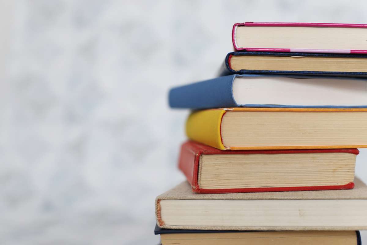 Books on a white table in a bookstore