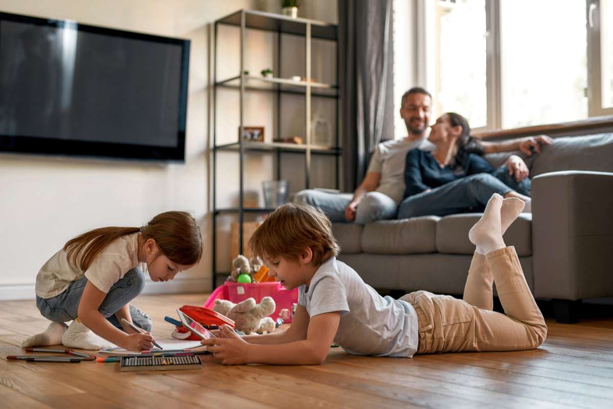 Happy family with children relax at home on weekend (R) (S)