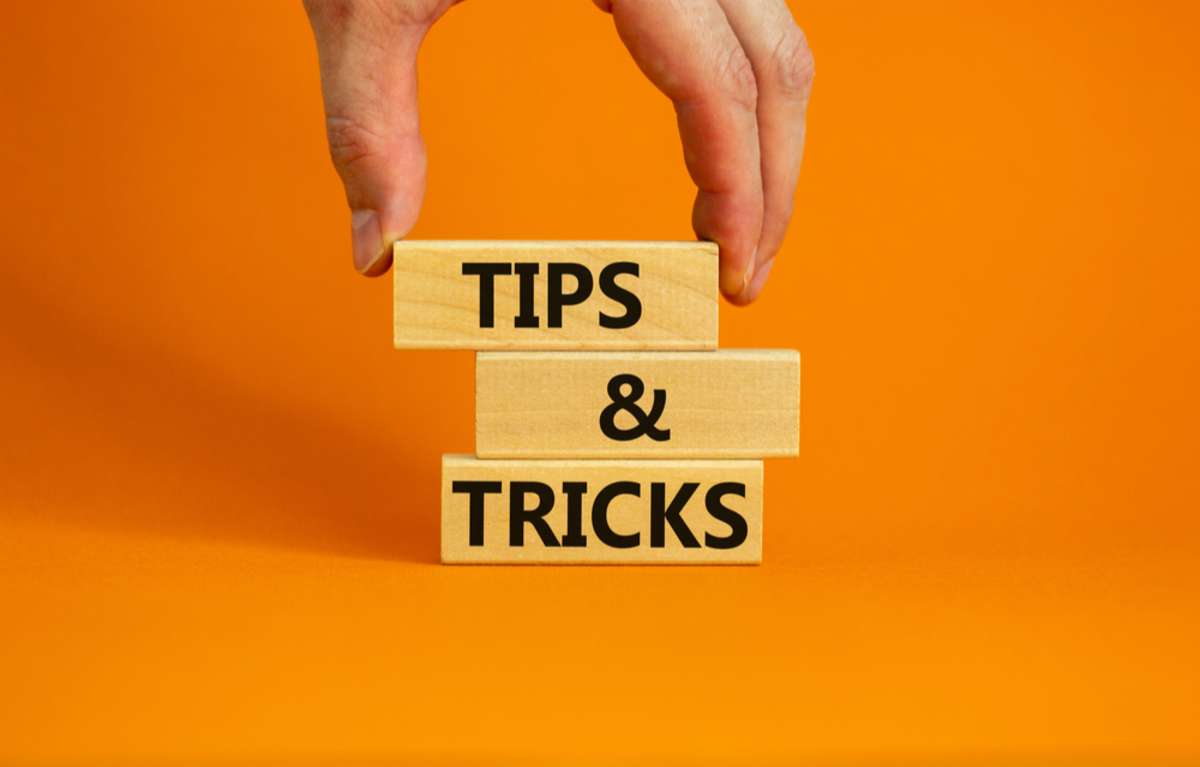 Tips and tricks symbol. Wooden blocks with words Tips and tricks
